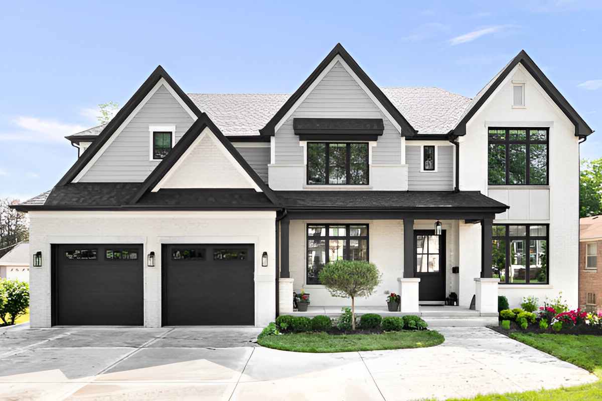 white brick house with black trim